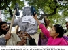 Pix24-38
KARACHI: Dec24 â Activists of Labour Party hit an effigy of US President George W Bush with shoes, during a demonstration to demand release of Muntazir Zaidi, outside Karachi Press Club.
ONLINE PHOTO by Sabir Mazhar
